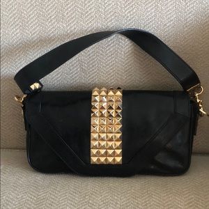 Black leather Tory Burch shoulder bag.